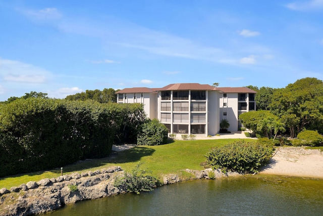 view of property with a water view