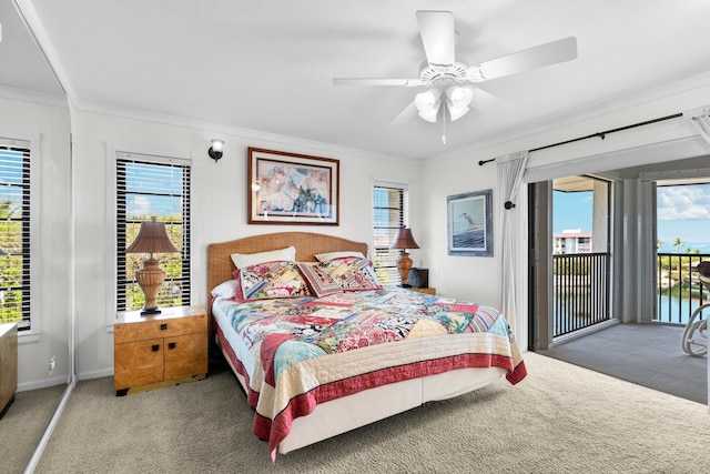 carpeted bedroom with crown molding, access to outside, and ceiling fan