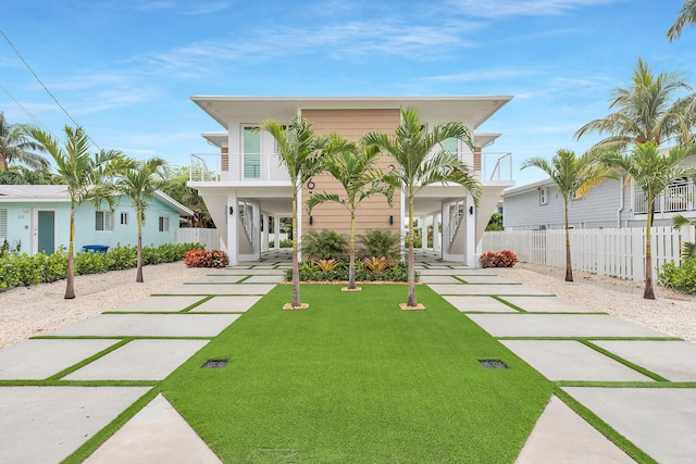 view of front of house with a balcony