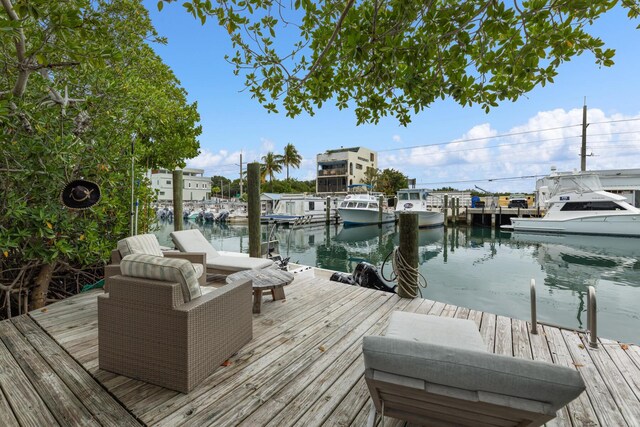 dock area featuring a water view