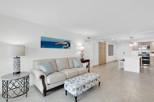 living room featuring light tile patterned flooring