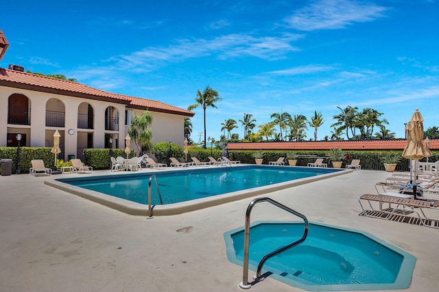 view of swimming pool featuring a patio