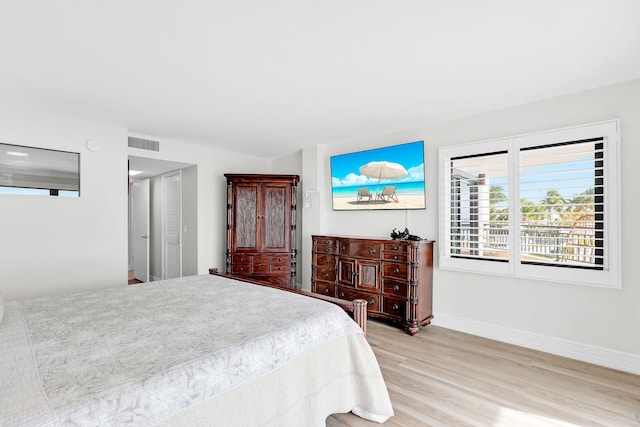 bedroom featuring light hardwood / wood-style flooring