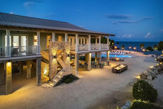 view of pool featuring a patio and french doors