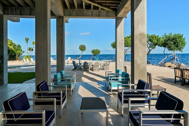 view of patio featuring a water view