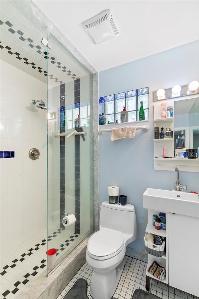 2525 Patterson Ave, Key West, FL 33040 - full bath with a stall shower, toilet, tile patterned floors, and a sink