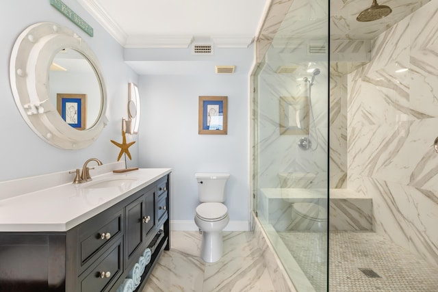 bathroom with a tile shower, vanity, ornamental molding, and toilet