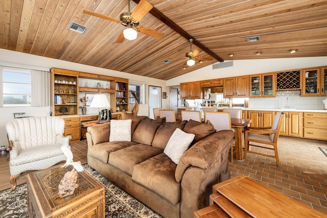 living room featuring ceiling fan, lofted ceiling, bar area, and wooden ceiling