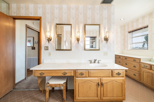 bathroom featuring vanity and tile patterned floors