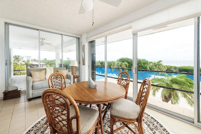 sunroom / solarium with ceiling fan