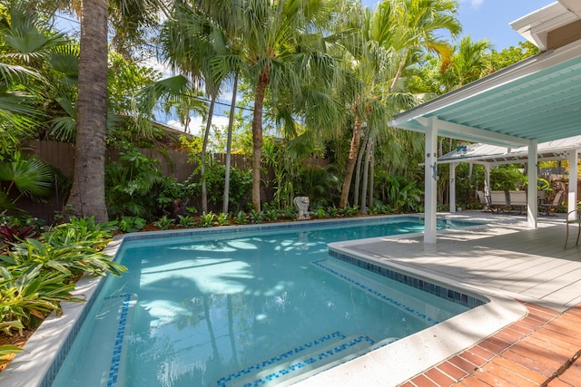 1706 Seminary St, Key West, FL 33040 - view of pool featuring a fenced backyard and a wooden deck