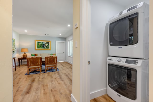 1706 Seminary St, Key West, FL 33040 - washroom featuring stacked washer / dryer, light wood-type flooring, and recessed lighting