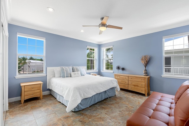 bedroom with multiple windows, ornamental molding, and ceiling fan