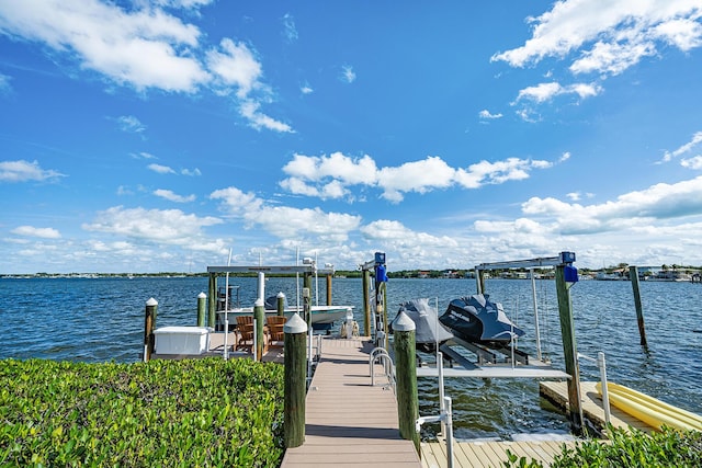 view of dock with a water view