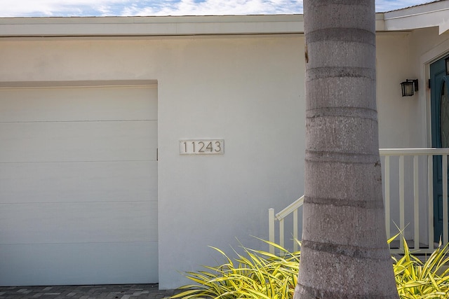 property entrance featuring a garage