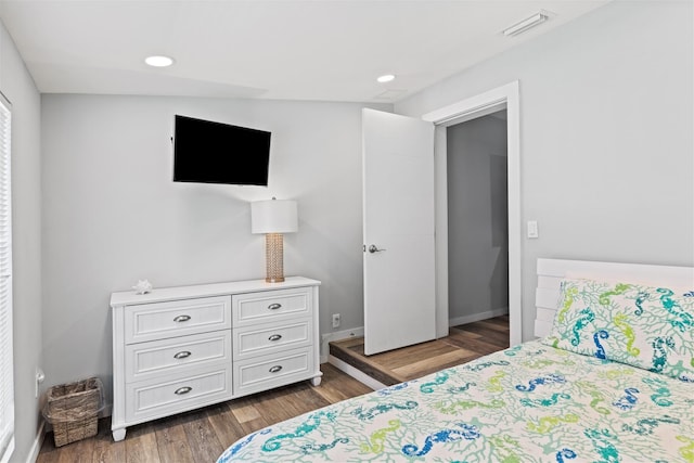 bedroom featuring dark hardwood / wood-style floors