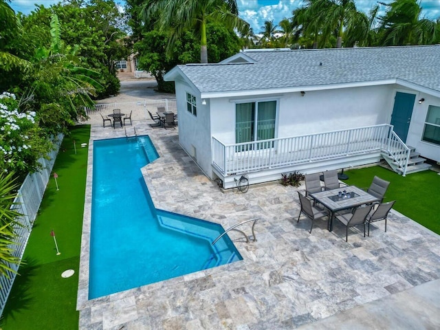 back of house with a patio area