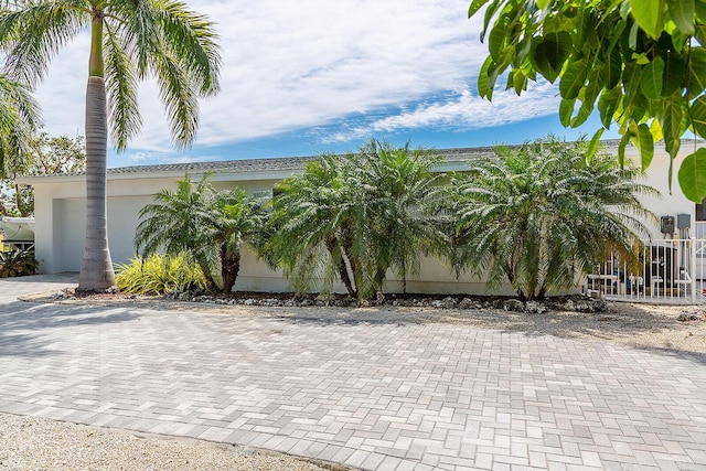 view of front of home with a garage