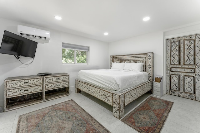 bedroom featuring an AC wall unit