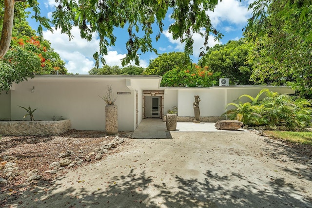 rear view of property with a patio