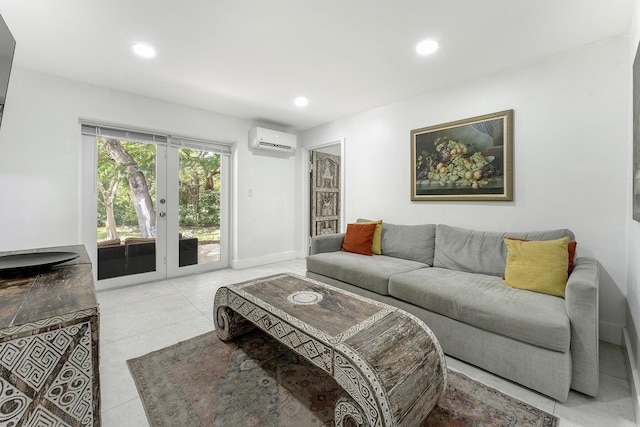 tiled living room featuring an AC wall unit and french doors