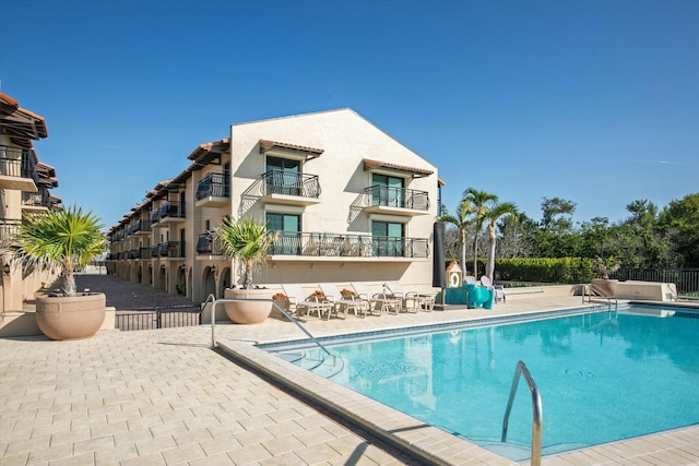 1616 Atlantic Blvd Unit 13, Key West, FL 33040 - community pool featuring a patio and fence