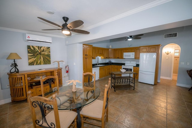 tiled dining space featuring ceiling fan, ornamental molding, a wall mounted AC, and sink