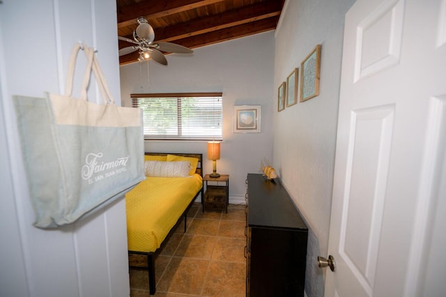 tiled bedroom with wood ceiling and lofted ceiling with beams