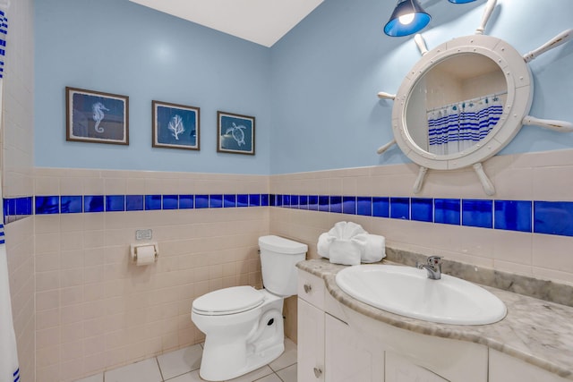 33 Kyle Way, Marathon, FL 33050 - bathroom featuring tile patterned flooring, vanity, tile walls, a wainscoted wall, and a shower with curtain