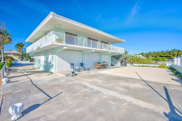 33 Kyle Way, Marathon, FL 33050 - rear view of property with a balcony