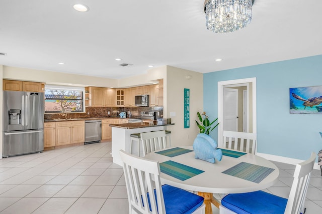 33 Kyle Way, Marathon, FL 33050 - dining room with light tile patterned floors, a chandelier, and recessed lighting