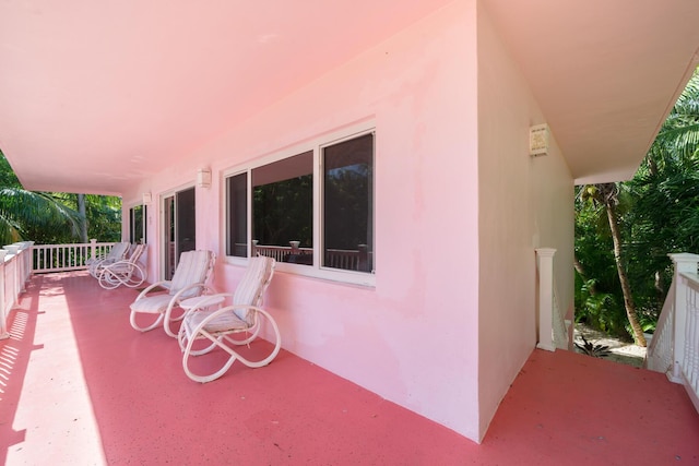 view of patio featuring a porch