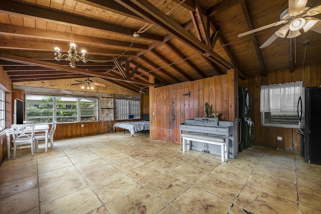 unfurnished sunroom with washer / dryer, vaulted ceiling with beams, ceiling fan with notable chandelier, and wood ceiling