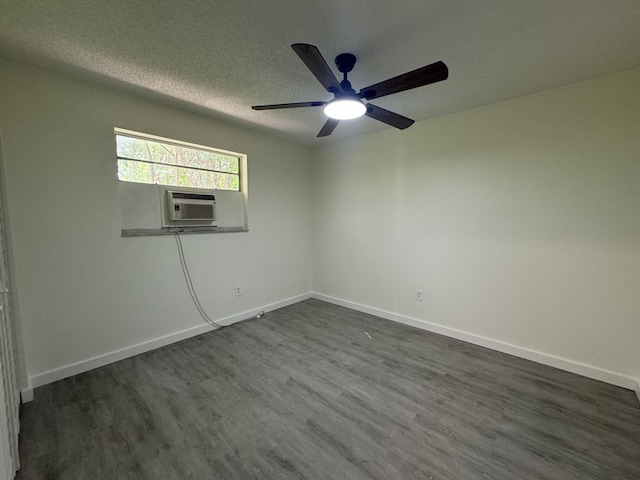 220 W Indies Rd, Tavernier, FL 33070 - unfurnished room with dark wood-type flooring, ceiling fan, a textured ceiling, and cooling unit
