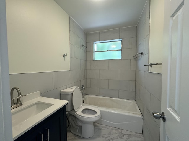 220 W Indies Rd, Tavernier, FL 33070 - bathroom with marble finish floors, shower / tub combination, vanity, and tile walls