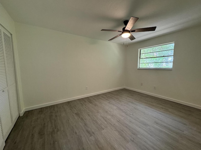 220 W Indies Rd, Tavernier, FL 33070 - unfurnished bedroom featuring dark wood-style flooring, a closet, and ceiling fan