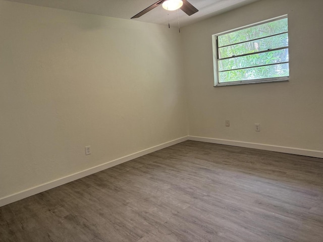 220 W Indies Rd, Tavernier, FL 33070 - spare room with dark wood finished floors and ceiling fan