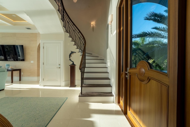 entryway with crown molding