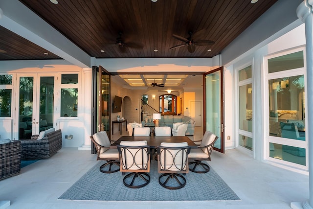 view of patio featuring french doors and ceiling fan