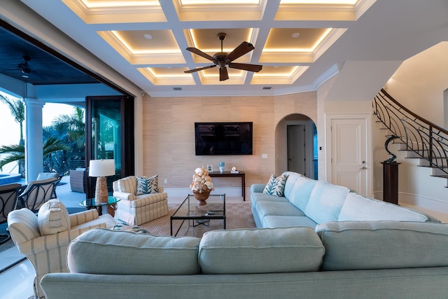 living room with crown molding, ceiling fan, coffered ceiling, and beam ceiling