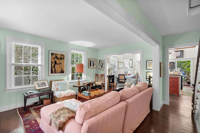 living room featuring dark wood-type flooring