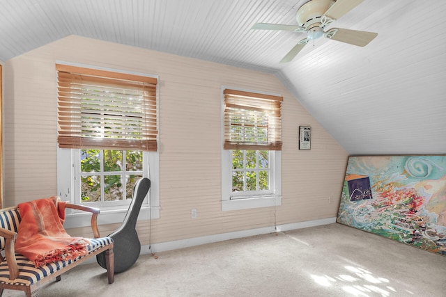 sitting room featuring lofted ceiling, light carpet, and ceiling fan