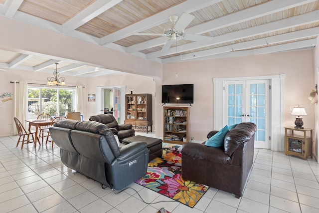 tiled living room with french doors, wood ceiling, beam ceiling, and ceiling fan with notable chandelier