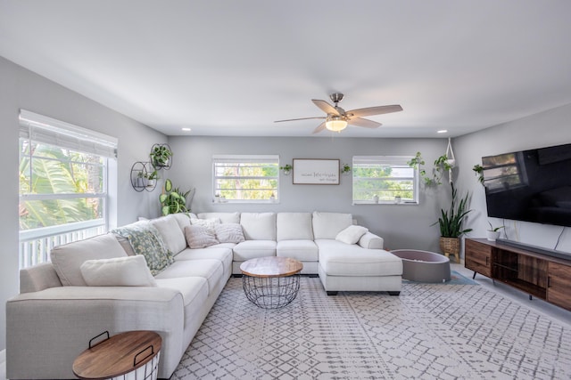 living room featuring ceiling fan