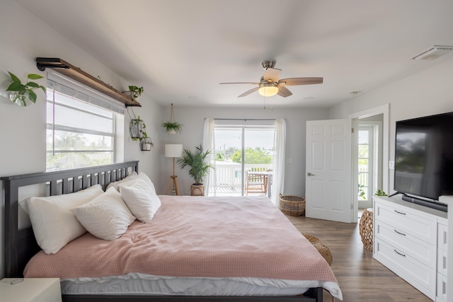 bedroom with ceiling fan, access to outside, and dark hardwood / wood-style flooring