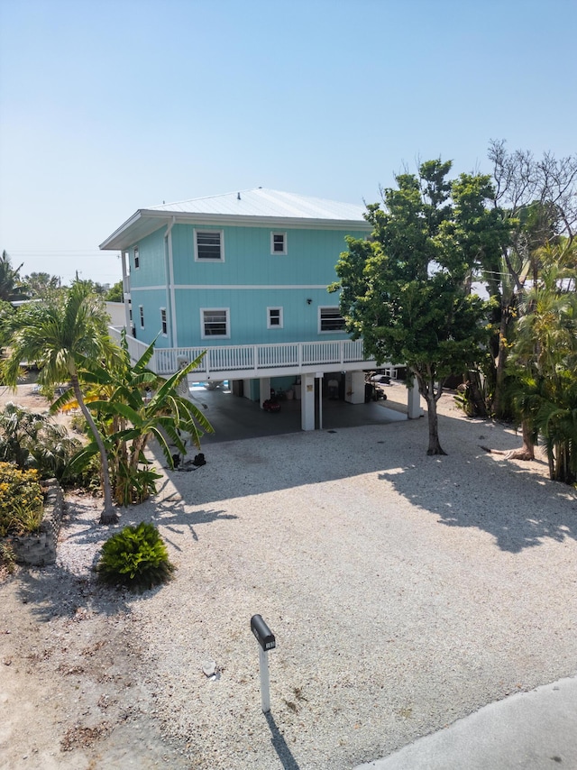 view of front facade featuring a carport