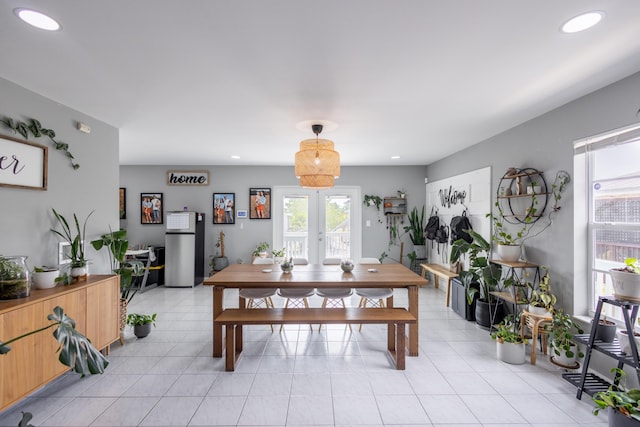 tiled dining area with french doors