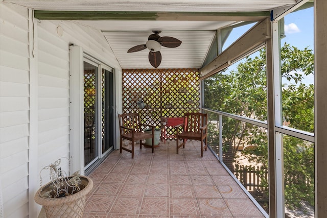 exterior space with ceiling fan