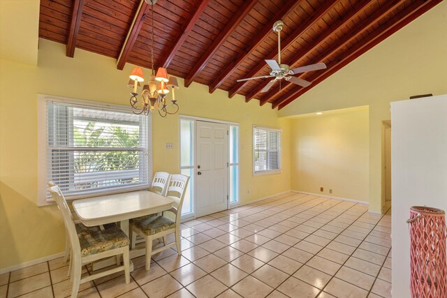 dining area featuring light tile patterned floors, high vaulted ceiling, beamed ceiling, and baseboards