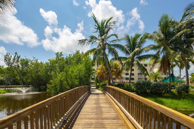 surrounding community featuring a water view